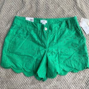 Crown & Ivy 6p Shelby 4”inseam short sits just below the waist with a slim fit